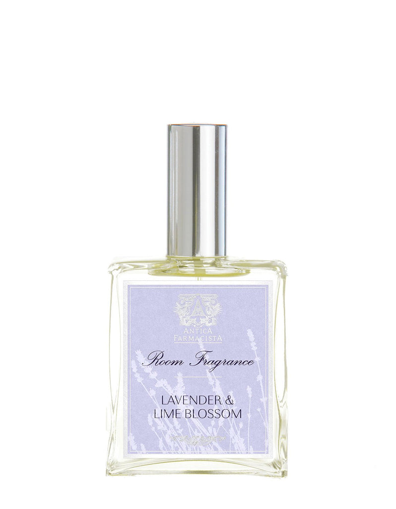 A 100ml glass room spray bottle with a silver cap features the Antica Farmacista - Lavender & Lime Blossom label, adorned with a lavender and white floral design.