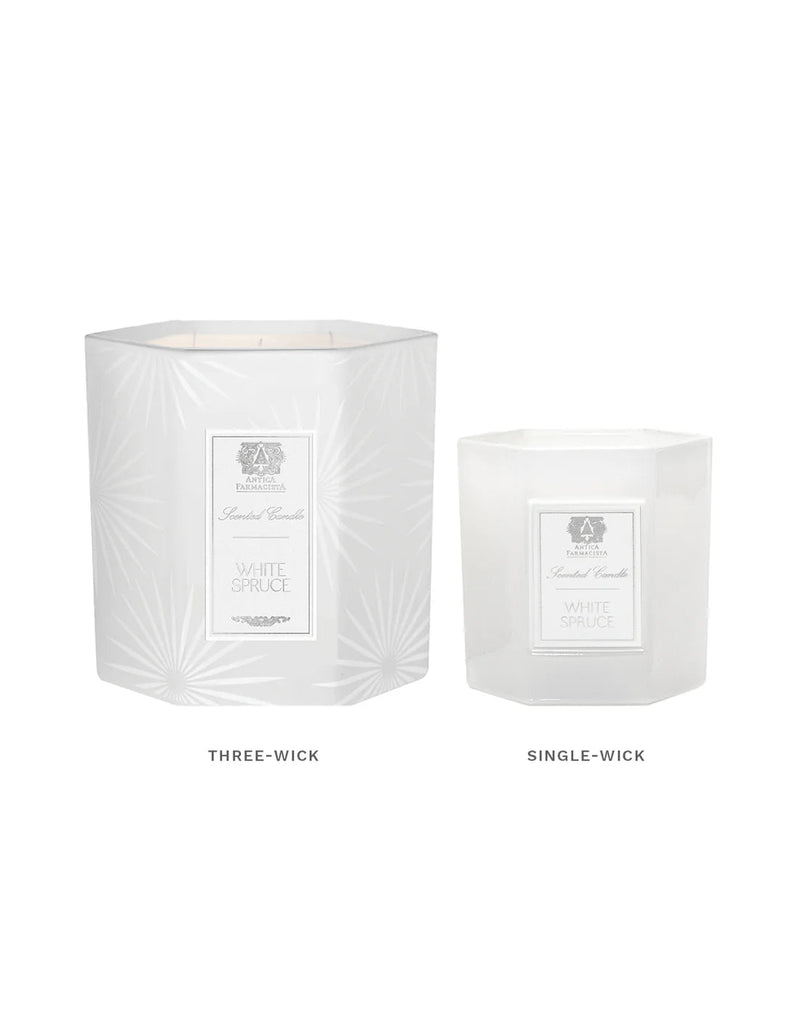 Antica Farmacista offers luxury with two white spruce candles: the Three-Wick in a large hexagonal jar and the Single-Wick in a smaller one, both featuring subtle geometric patterns that capture the essence of fresh cut spruce.