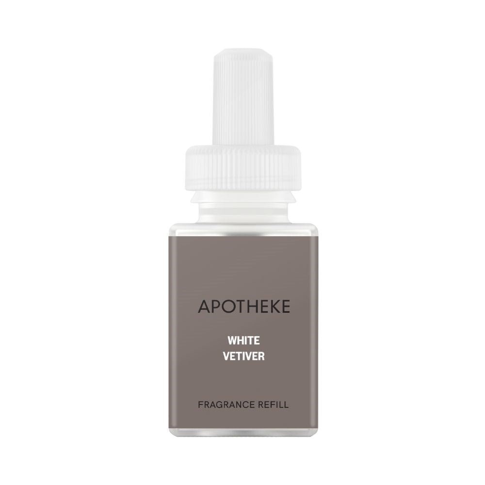 Enhance your Pura Smart Diffuser with the Apotheke White Vetiver Refill, presented in a small transparent bottle with a grey label and white cap. Enjoy the luxury fragrance experience set against a simple white background.