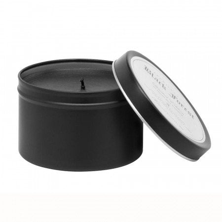 The Archipelago Black Forest Candle Tin features a sleek black vessel with rich black wax and a single wick. Its white-labeled lid adds style, making it ideal for fans of ebony woods or the mysterious allure of Black Forest scents.