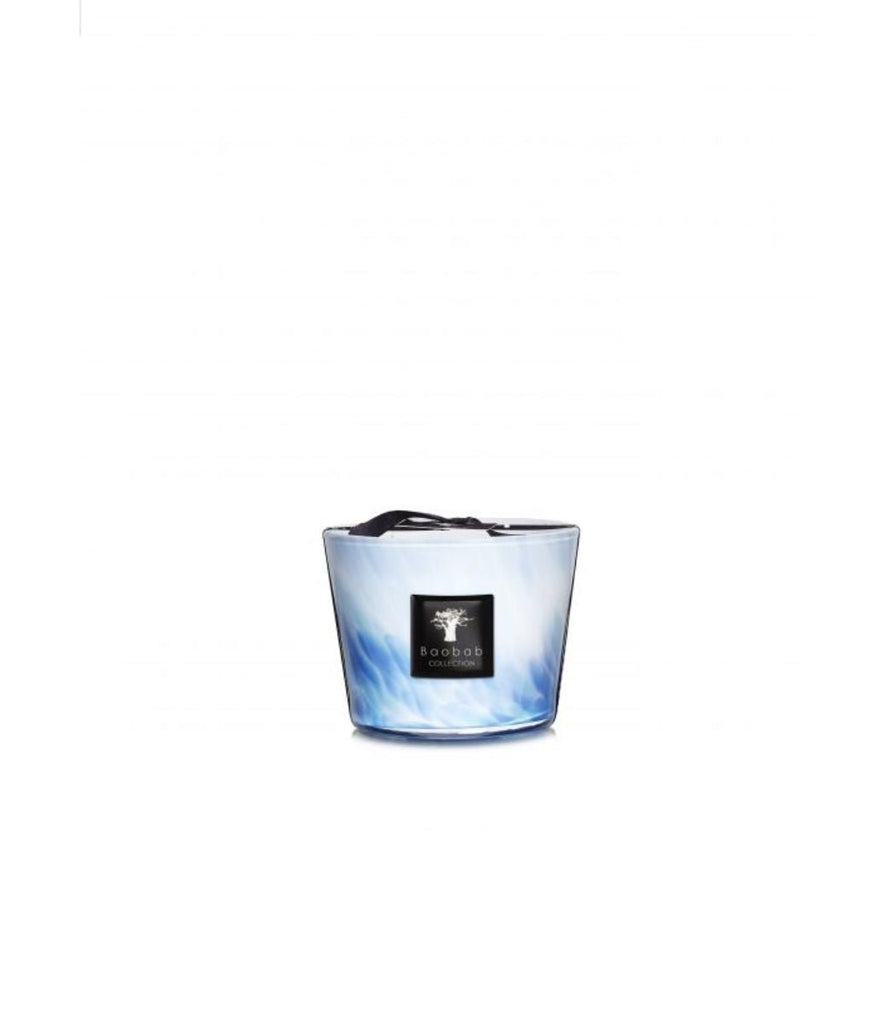 Discover the Boabab - Eden Seaside Max 10 Candle by Baobab, a decorative piece in opalescent glass with a marbled blue and white design. Featuring a sea salt and amber aroma, it includes a small handle, black label with white text, set against a plain white backdrop for peaceful moments.