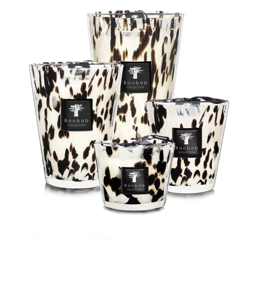 Four elegant Baobab Collection candles, named Black Max 16 from the Black Pearls series, feature varying sizes and a black and white marbled design in hand-blown glass. Each candle has a black label with a tree logo and brand name, arranged against a pristine white background.