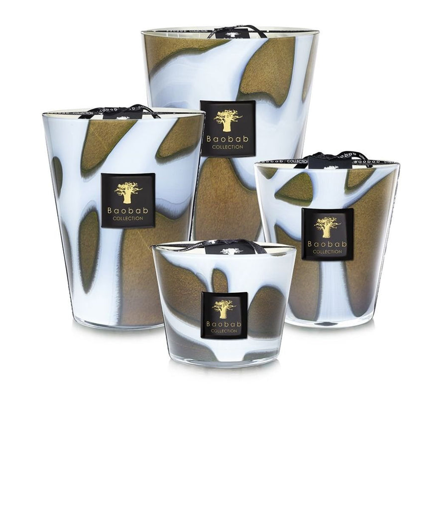 Four Baobab - Stones - Agate Max 10 candles, made from hand-blown glass with abstract brown and white patterns, feature a black label with gold text and a tree logo. These agate-inspired candles are showcased elegantly on a pristine white background.