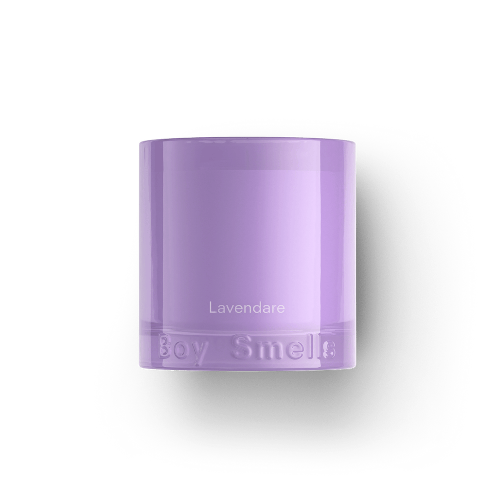The Boy Smells - Lavendare 8.5oz Candle features a lavender hue in a glass jar with Boy Smells branding, packaging the floral essence of lavender against a clean white backdrop.