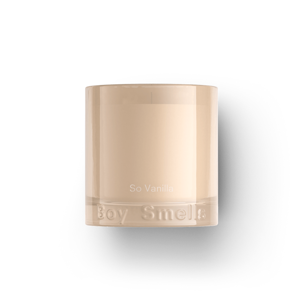 The Boy Smells - So Vanilla 8.5oz Candle features a beige wax in a clear glass jar with notes of Golden Amber and embossed Boy Smells branding at the base, shown against a white background.