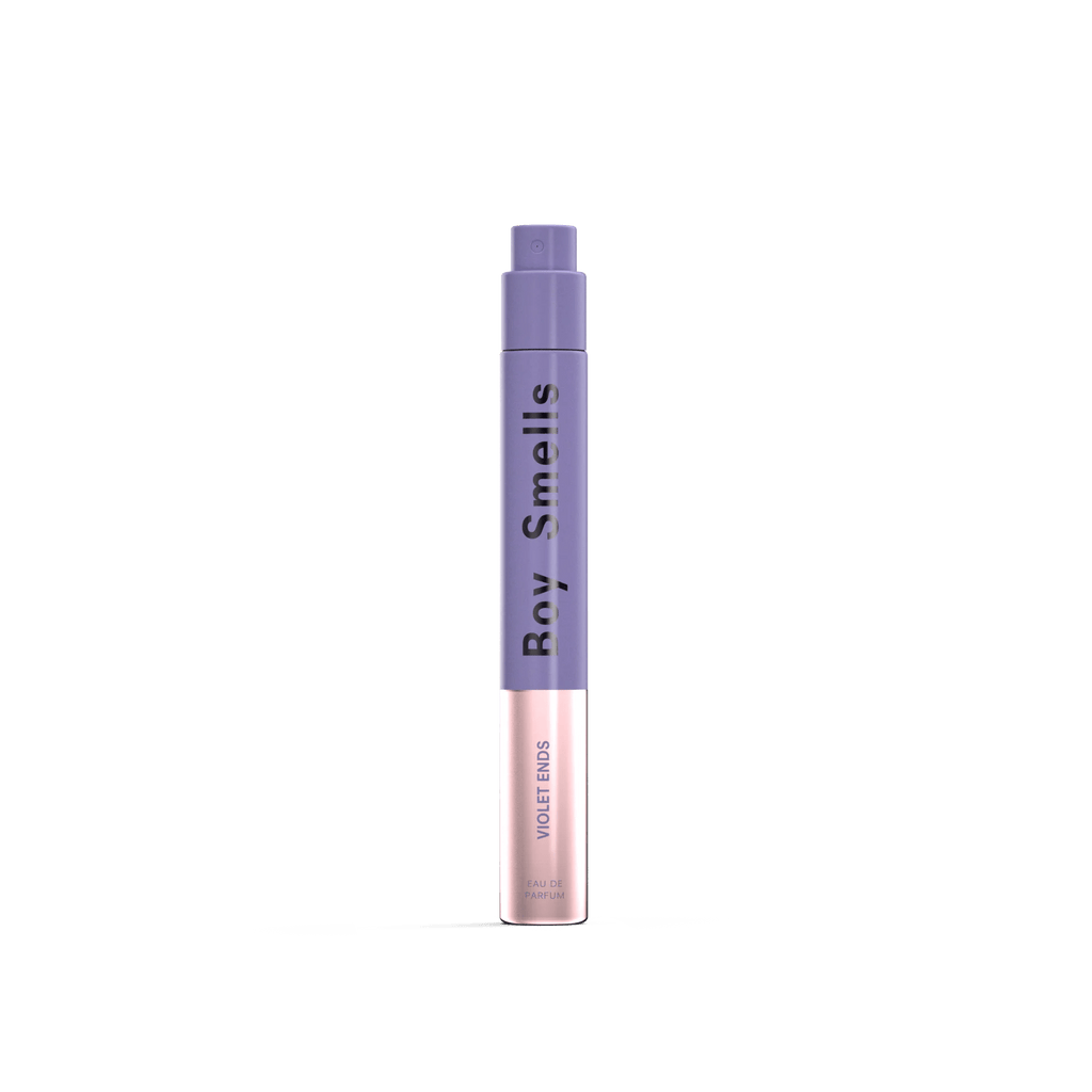 Boy Smells - Violet Ends Eau de Parfum 10ml features a sleek cylindrical bottle with a purple cap and upper half, metallic pink lower half, and “Violet Ends” label. The brand name runs vertically on the purple section, reflecting earthy floral notes.