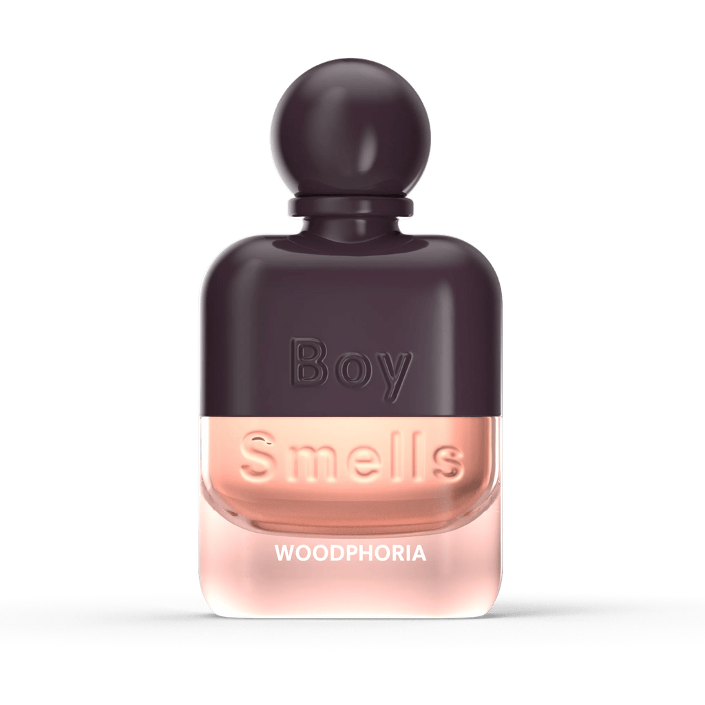 The Boy Smells - Woodphoria Eau de Parfum 50ml features a bottle with a pink-to-purple gradient and rounded cap, capturing notes of fig leaves and sandalwood.
