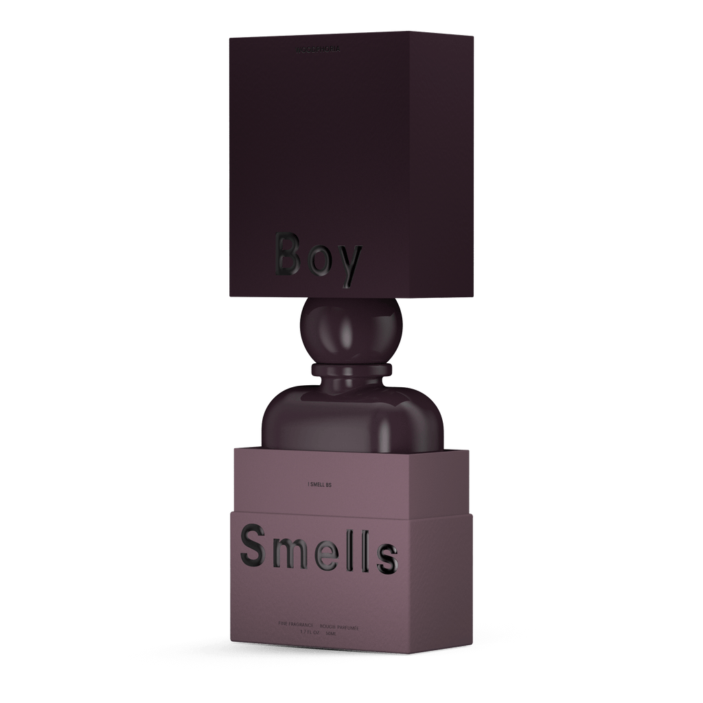 A sleek dark purple Boy Smells - Woodphoria Eau de Parfum 50ml bottle with a cube cap sits on its branded box. Its modern geometric design and embossed text evoke sophistication, highlighted by sandalwood notes.