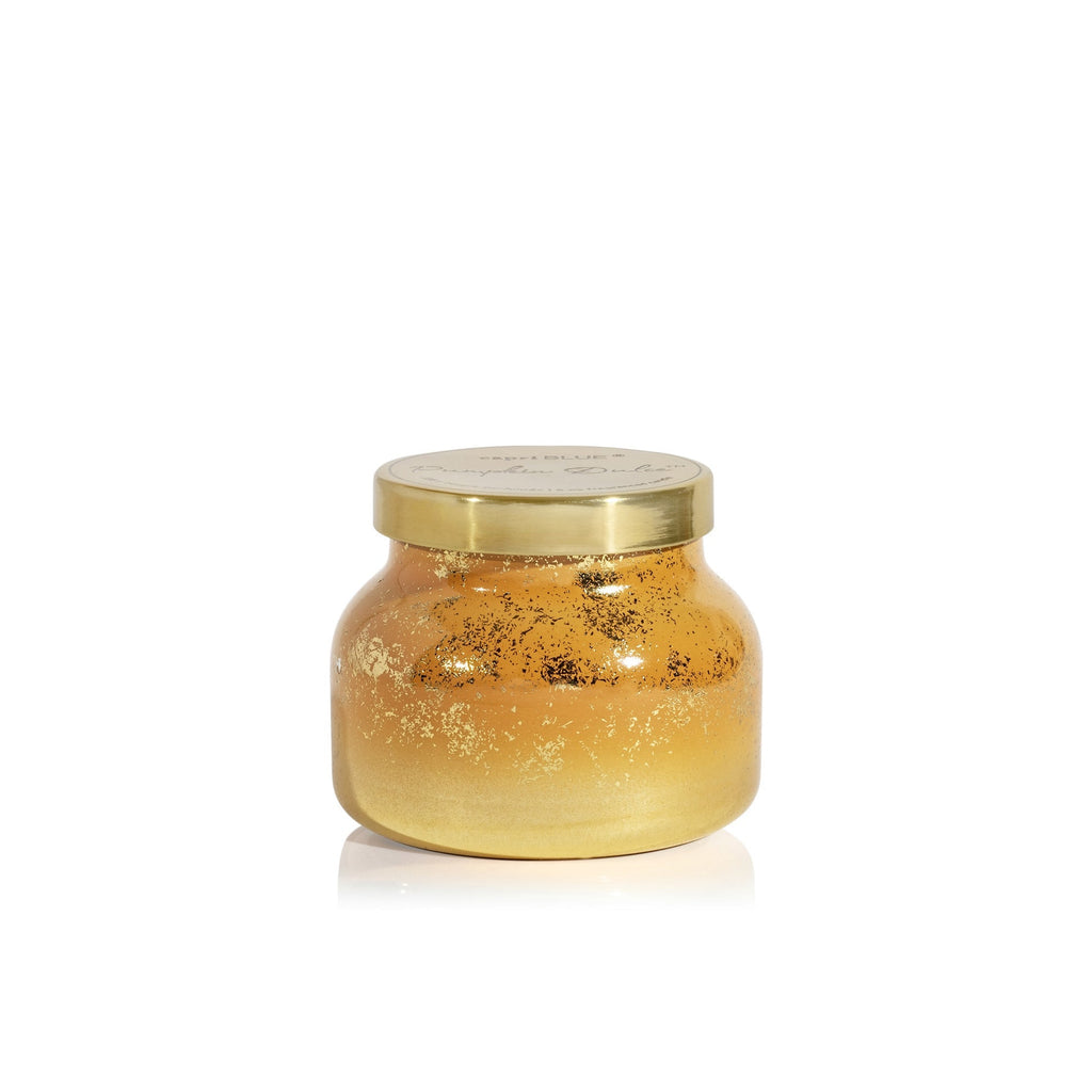The Capri BLUE - Pumpkin Dulce Petite Jar, 8 oz, is a gold holiday candle with a metallic finish, rounded body, and matching gold lid, set against a white background.