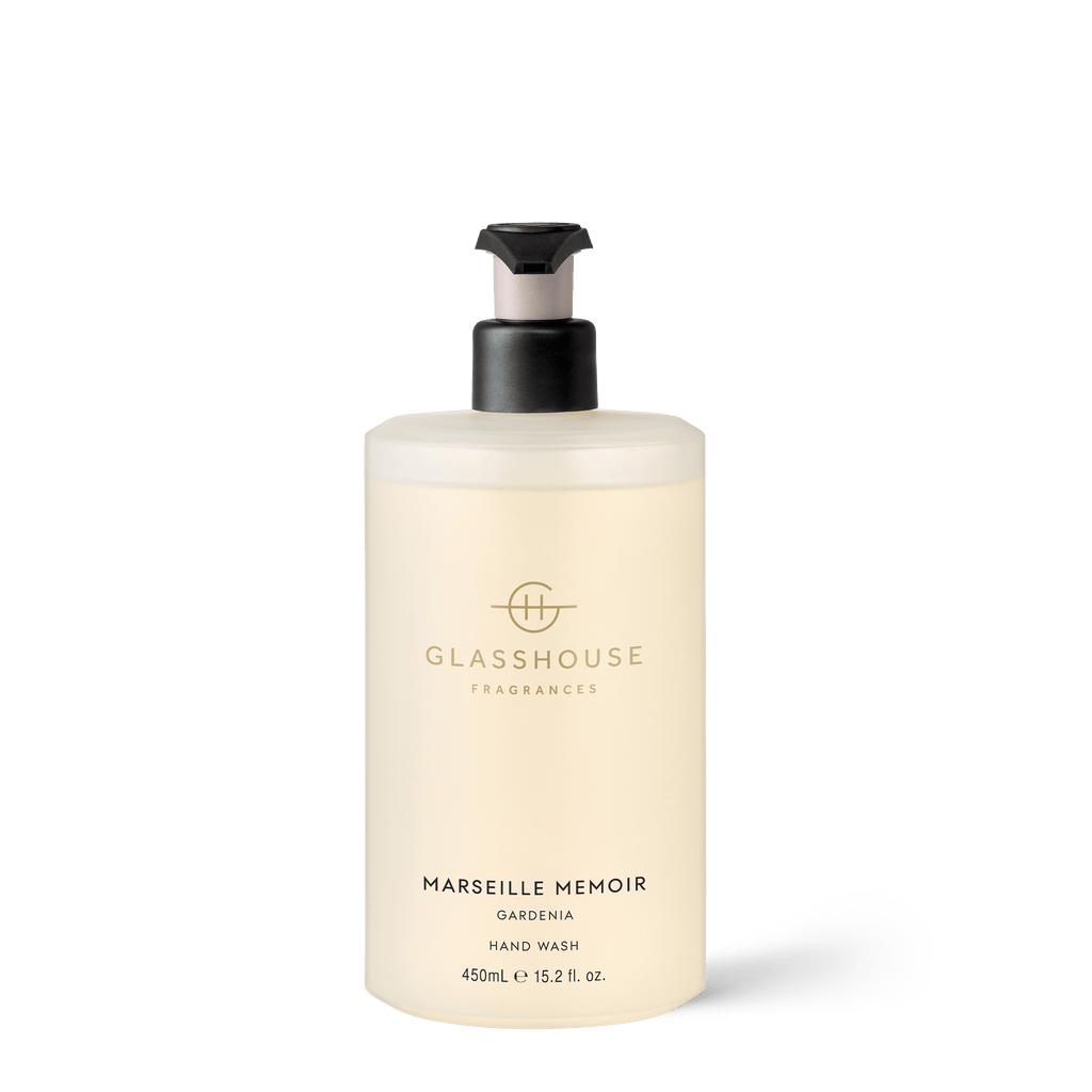 The Glasshouse Fragrances Marseille Memoir Liquid Hand Wash, with a light cream bottle and black pump, holds 450 ml (15.2 fl. oz.) and is enriched with shea and aloe, infused with the Cote d’Azur fragrance for a luxurious touch.