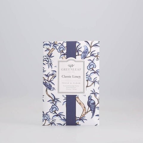 Greenleaf - Classic Linen Sachet features a blue floral and bird design on a white background with a dark blue vertical band showcasing the Fresh & Clean scent description.