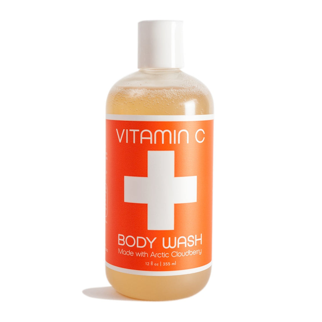 Kalastyle Nordic+Wellness Vitamin C Body Wash features an orange label with a white cross and text Made with Arctic Cloudberry Oil. The clear 12 fl oz (355 ml) bottle has a white cap and is enhanced with Organic Aloe Vera Juice for added nourishment.