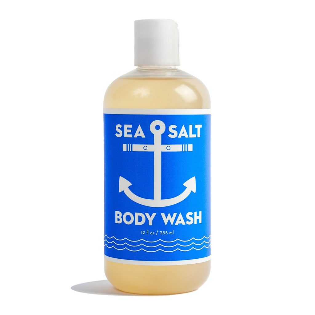 Kalastyles Swedish Dream Sea Salt Organic Body Wash boasts 12 fl oz (355 ml) of creamy yellow liquid in a cruelty-free, plastic bottle with a blue label and white anchor design, infused with Organic Aloe Vera Juice for a refreshing Sea Salt scent.