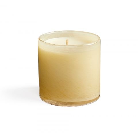 The Lafco Chamomile Lavender Classic 6.5 candle, made from calming soy wax, is set in a beige cylindrical glass holder with an unlit centered wick. It rests on a white surface against a plain background.