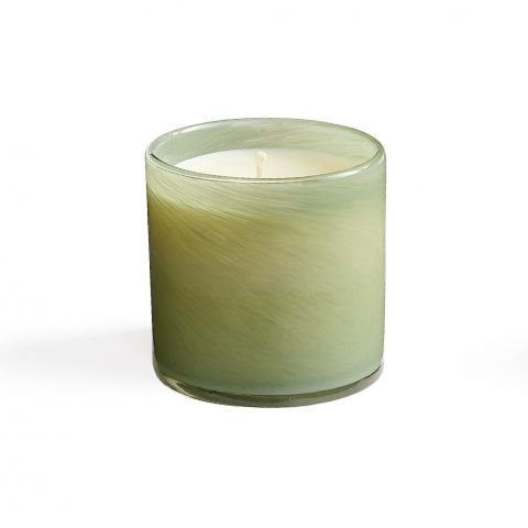 The Lafco - Fresh Cut Gardenia Classic 6.5 Candle, housed in a swirling-textured glass container, exudes an elegant gardenia fragrance against a white background.