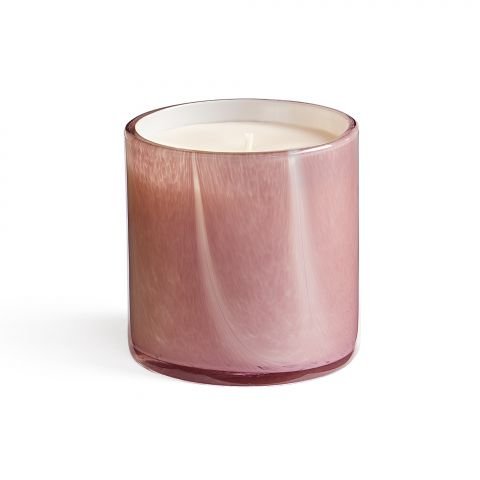 The Lafco Geranium Bourbon Classic 15.5oz Candle features a pink marbled glass exterior and white wax, emitting Geranium Bourbon notes. It has a glossy, cylindrical design, positioned upright against a plain white background.