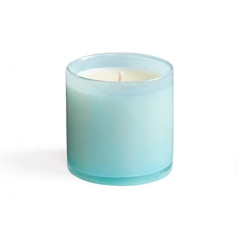The Lafco - Marine Classic 6.5 Candle by Lafco features a white soy wax candle in a translucent light blue hand-blown glass vessel, displayed against a plain white background.