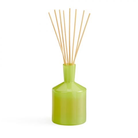 The Lafco Rosemary Eucalyptus 6oz Reed Diffuser features long wooden sticks that spread the scent evenly. Its glossy finish enhances the natural essence, set against a serene white backdrop.