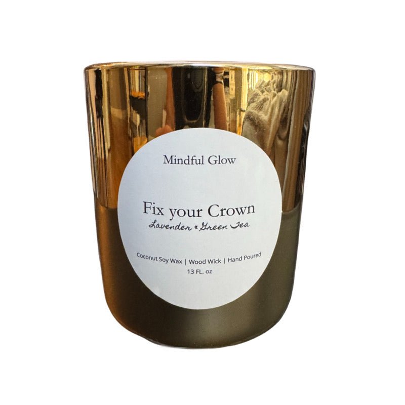 The Mindful Glow - Fix Your Crown Woodwick Candle 13oz features a gold jar, white label, and lavender & green tea scent. Made with coconut soy wax and a wood wick, hand-poured for quality.