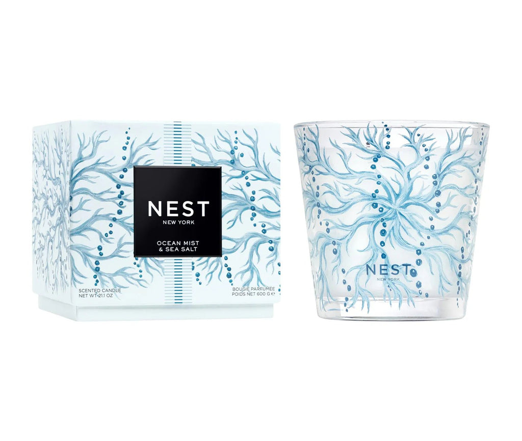 The Nest - Ocean Mist & Sea Salt Decorative 3-Wick Candle features a blue coral design on glass and comes with a matching box, blending coastal style with an ocean mist fragrance for an elegant touch.