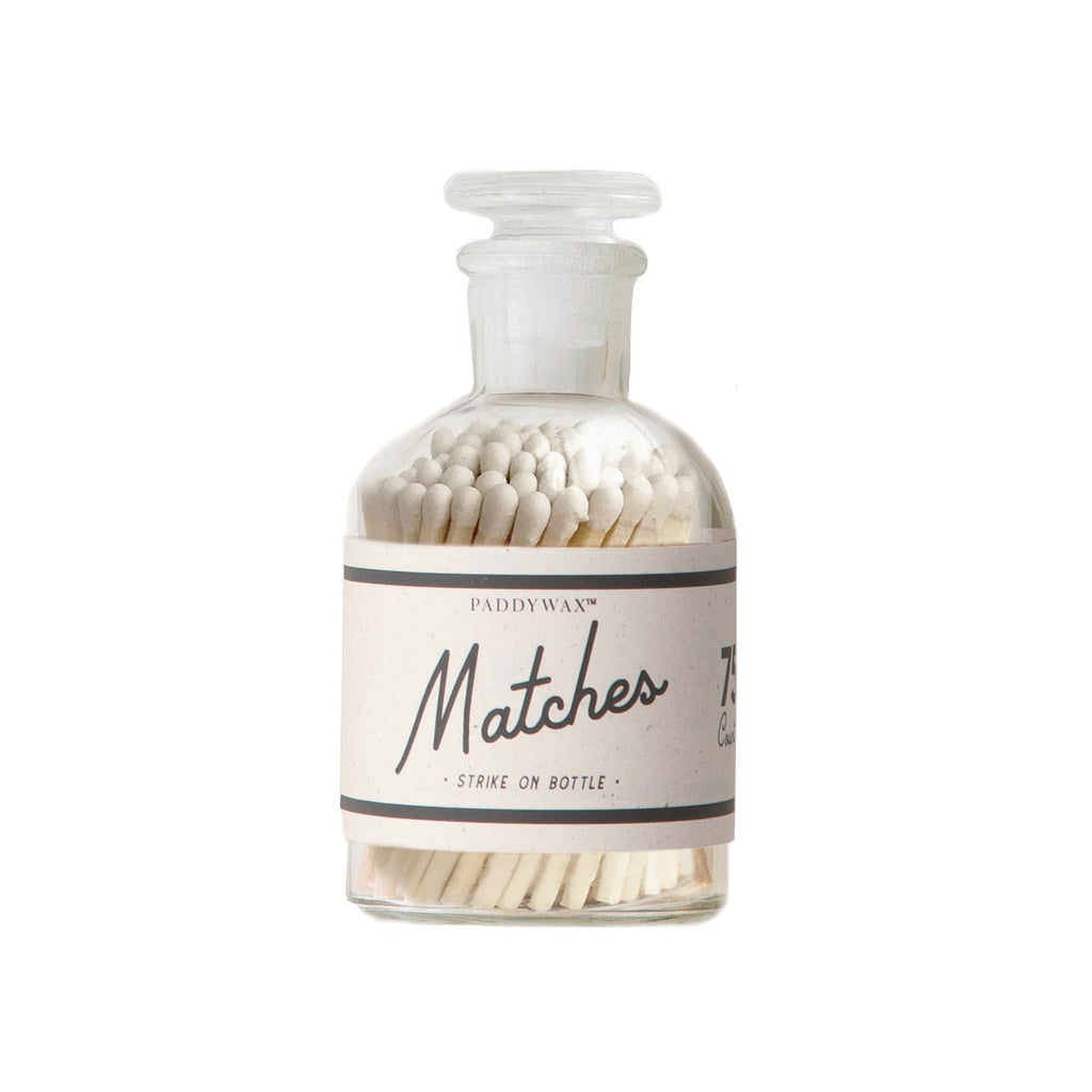 The Paddywax Decorative Matches 75pk includes a glass bottle of safety matches with a Matches label and Strike on Bottle instructions. The clear glass stopper makes it ideal for lighting your favorite Paddywax candles.