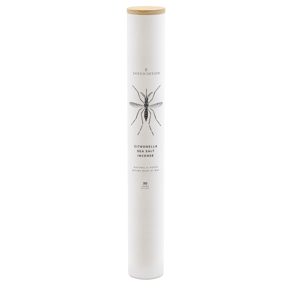 The Skeem Jumbo Citronella Sea Salt Incense comes in a tall, white cylinder with a wooden lid and a mosquito illustration. Contains 30 jumbo sticks—ideal for repelling insects.