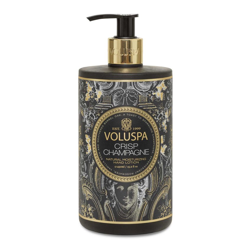 The Voluspa - Crisp Champagne Hand Lotion, with a luxe black and gold design and pump dispenser, adds sophistication to your skincare routine through its elegant patterns and charming Crisp Champagne fragrance.