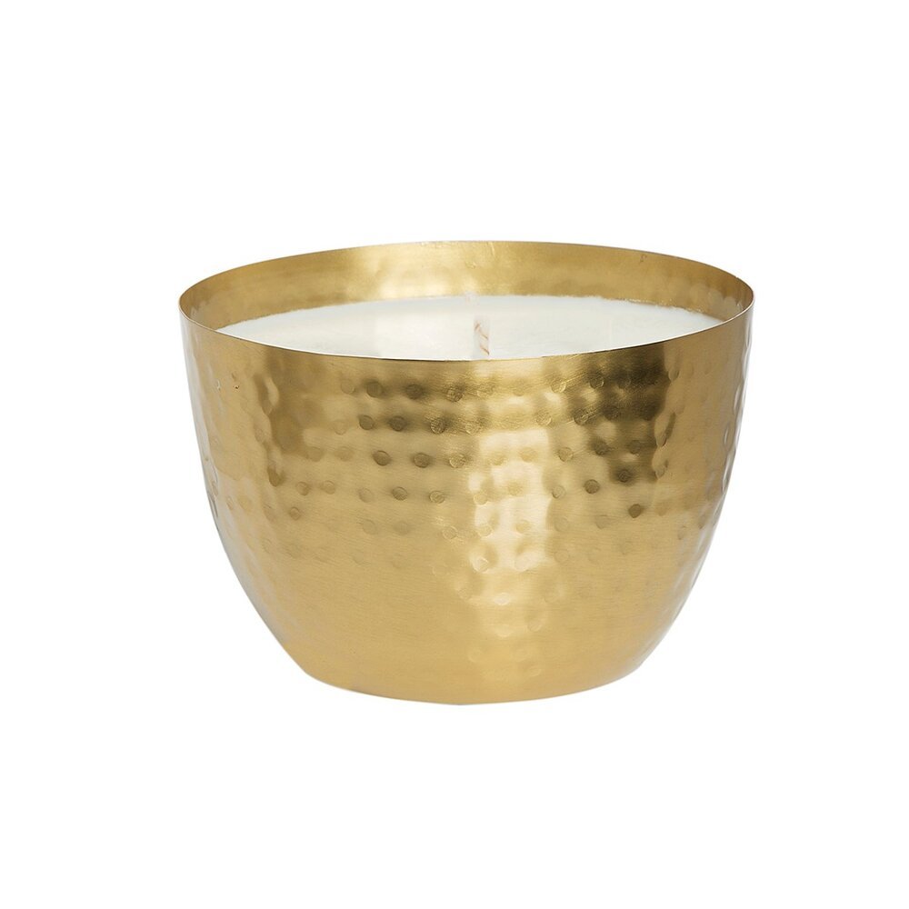 The Aqua De Soi Amber and Teakwood candle, set in a textured gold metallic 14oz round hammered bowl, exudes the warm scent of Golden Amber. Its reflective elegance is accentuated by the white candle with a single visible wick.