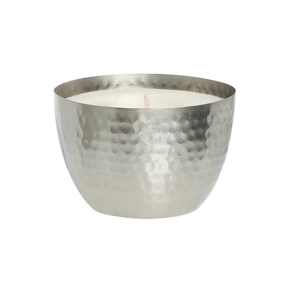 The Aqua De Soi - Sage and Vetiver 14oz Round Hammered Bowl Candle by Aqua De Soi features a metallic, silver sage hammered texture. It cradles a white candle with an oak moss scent, offering a single wick for an elegant ambiance.