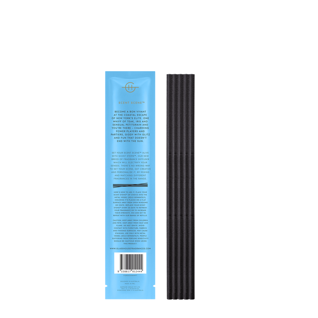 Side view of the Glasshouse Fragrances - Replacement Scent Stems - The Hamptons packaging shows a blue section with text, a winged logo, and barcode. It includes PETITGRAIN scent details and usage instructions, ideal for enhancing aroma with Scent Stems.