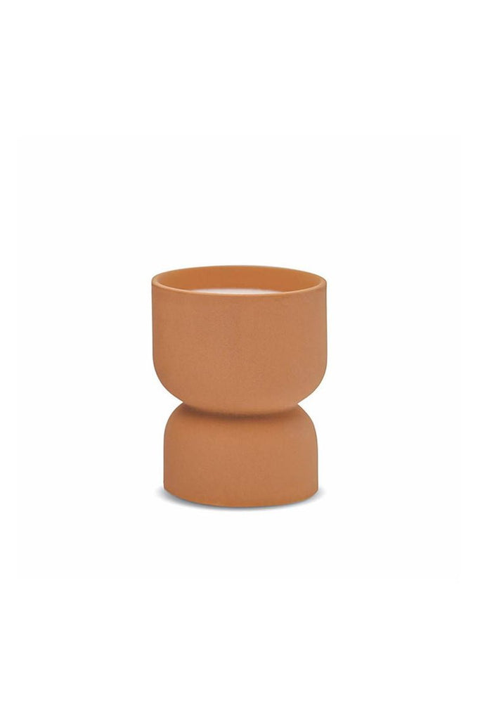 The Paddywax Form Wild Fig + Vetiver 6oz Candle features a modern, matte terracotta ceramic planter with a rounded bowl and slightly narrower base, displayed against a plain white background.